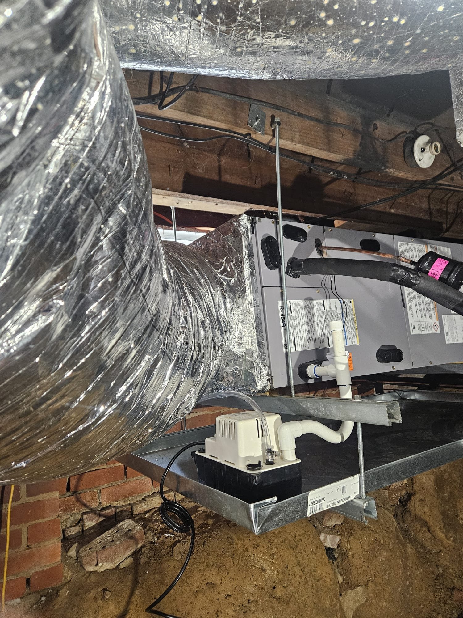 Modern HVAC setup in a crawl space, with secure mounting and quality insulation