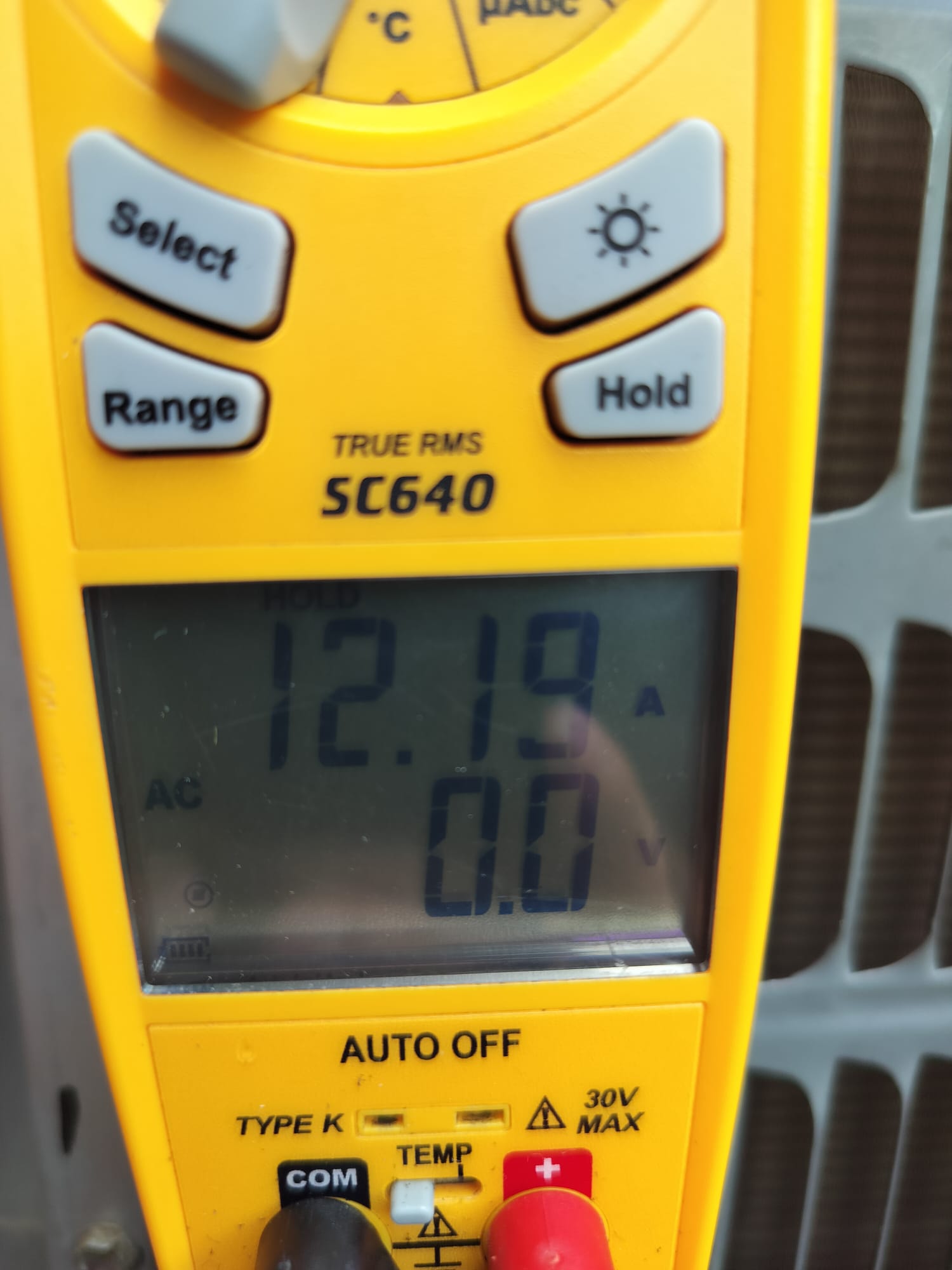 Clamp Meter Measuring Current on HVAC Unit