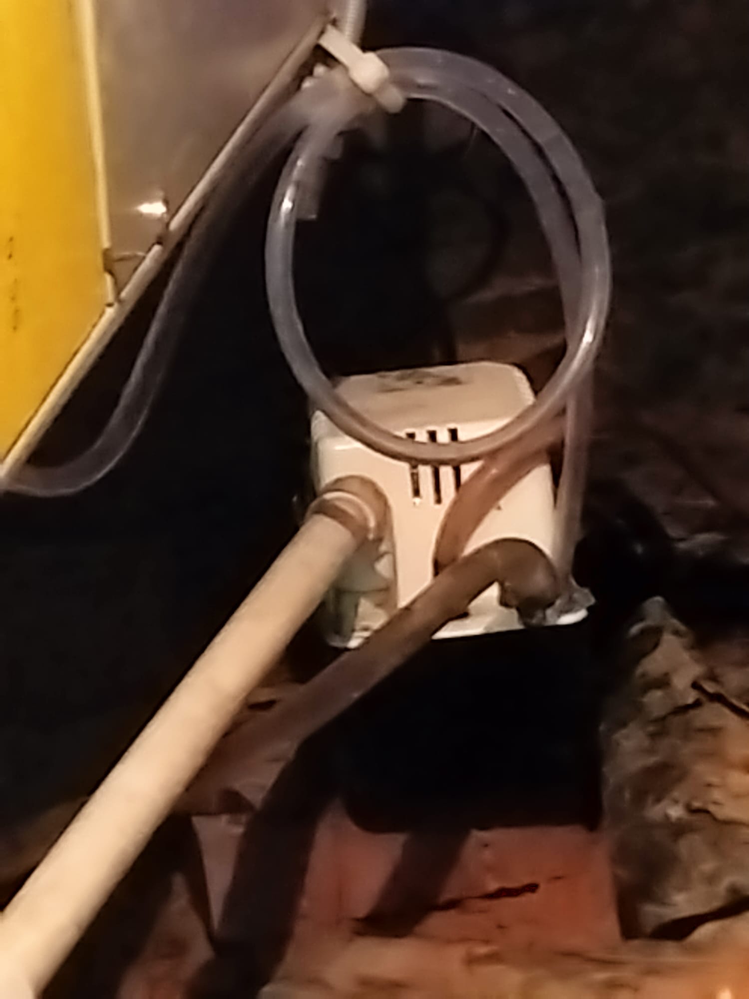 HVAC condensate pump and piping setup