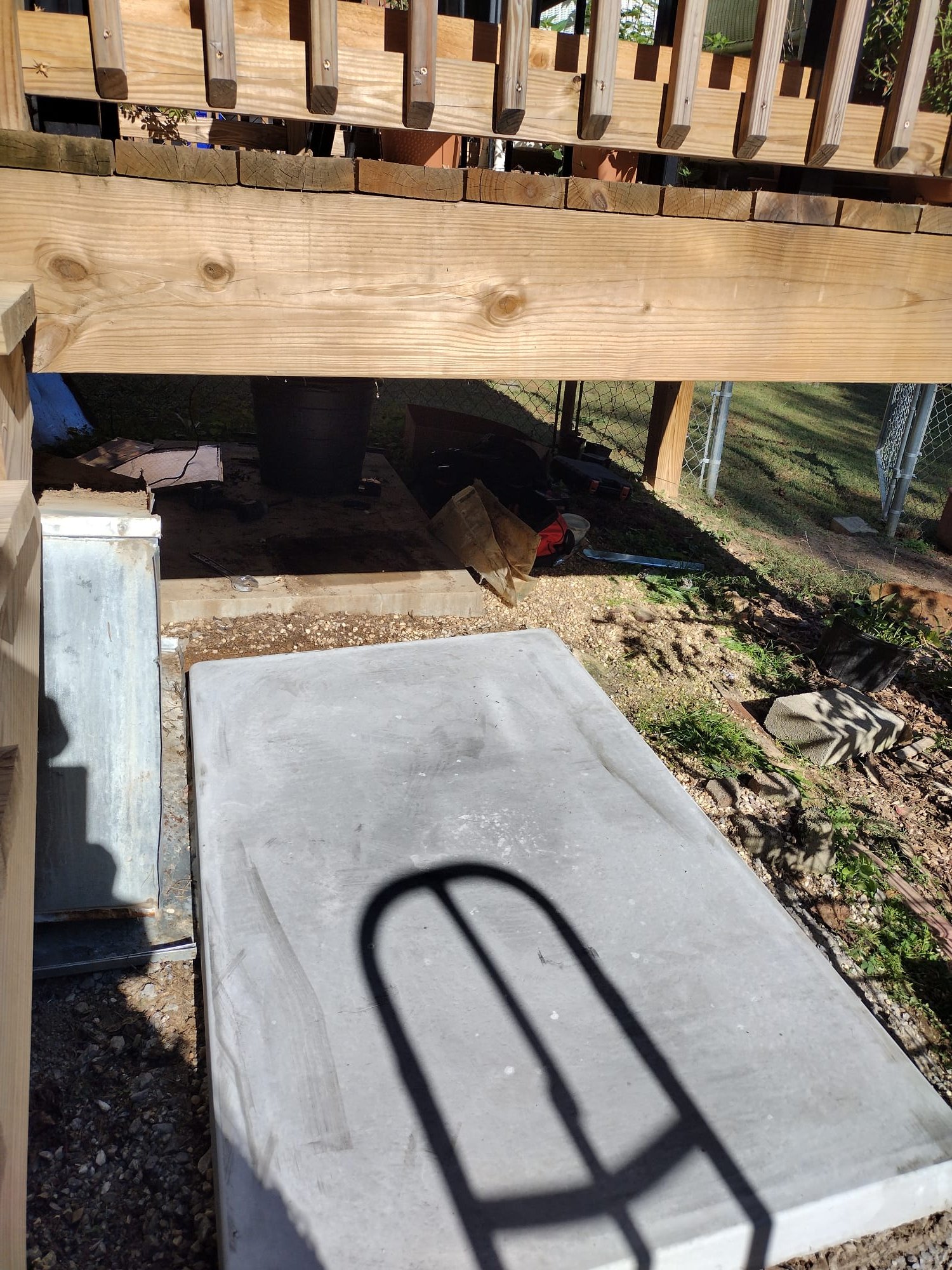 New concrete pad ready for HVAC installation