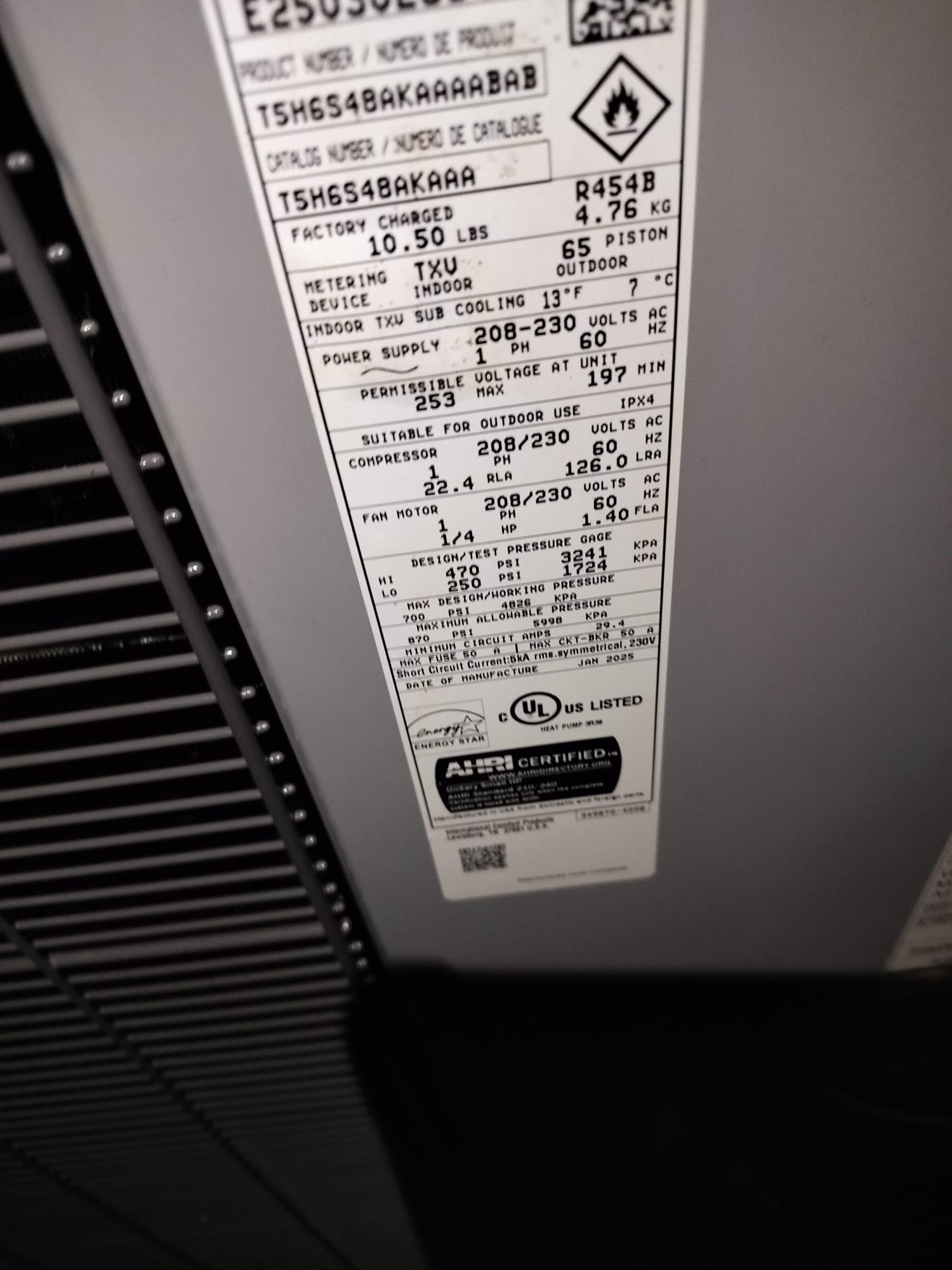 Manufacturer’s data label on the newly installed outdoor unit.