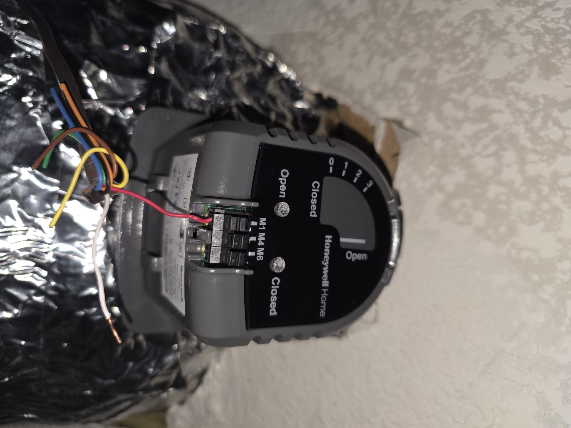 Honeywell HVAC damper actuator on ductwork