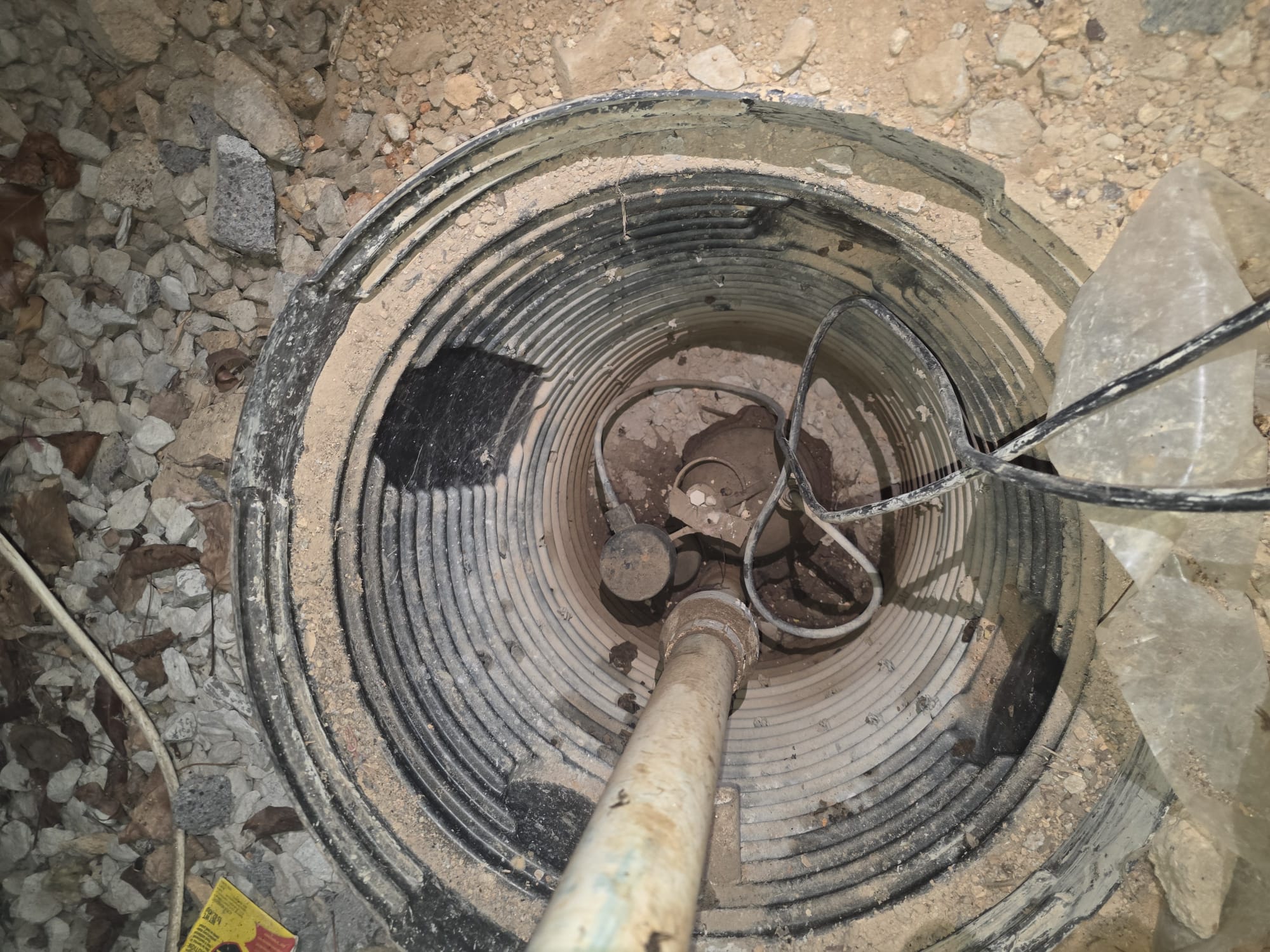 A closer look at a sump pit with a newly installed system