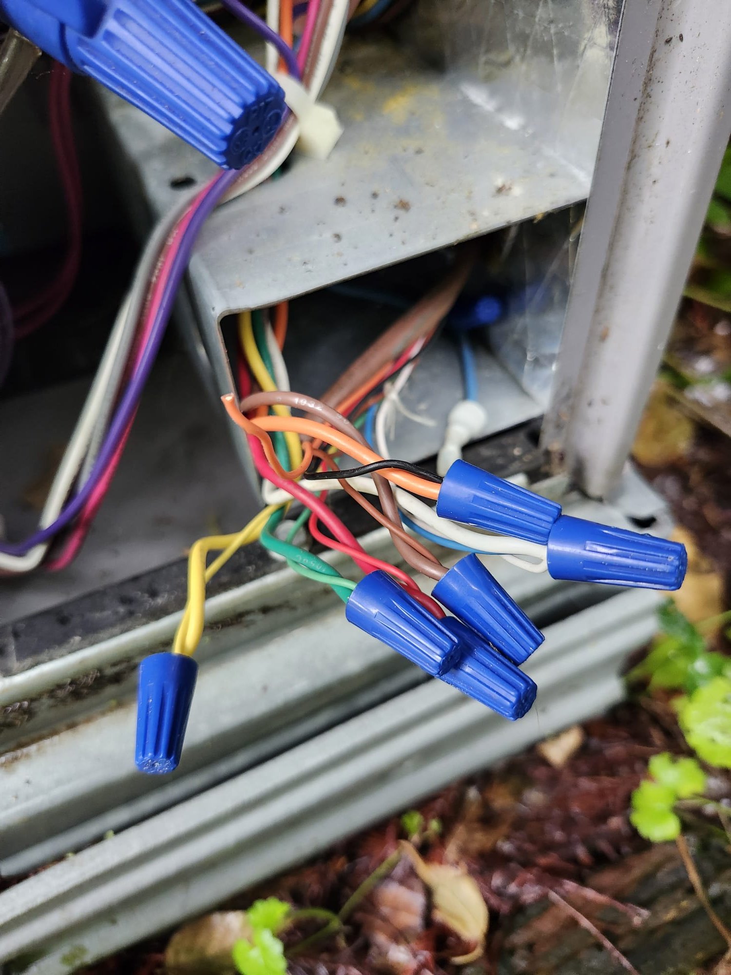 Inside view of the unit showing electrical wiring and proper connectors.