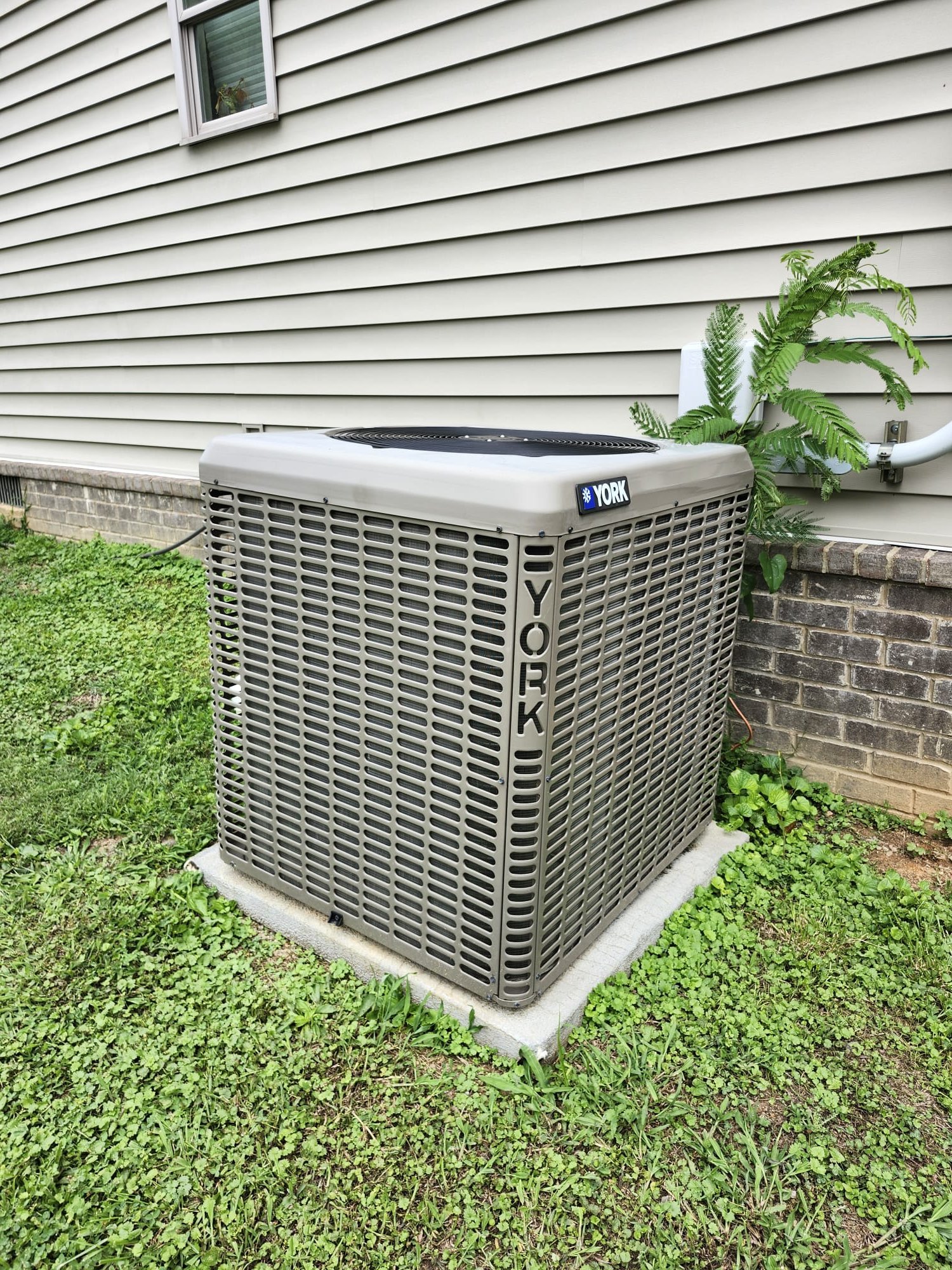 When an AC Runs but the House Still Feels Warm: A Cleveland HVAC Service Story