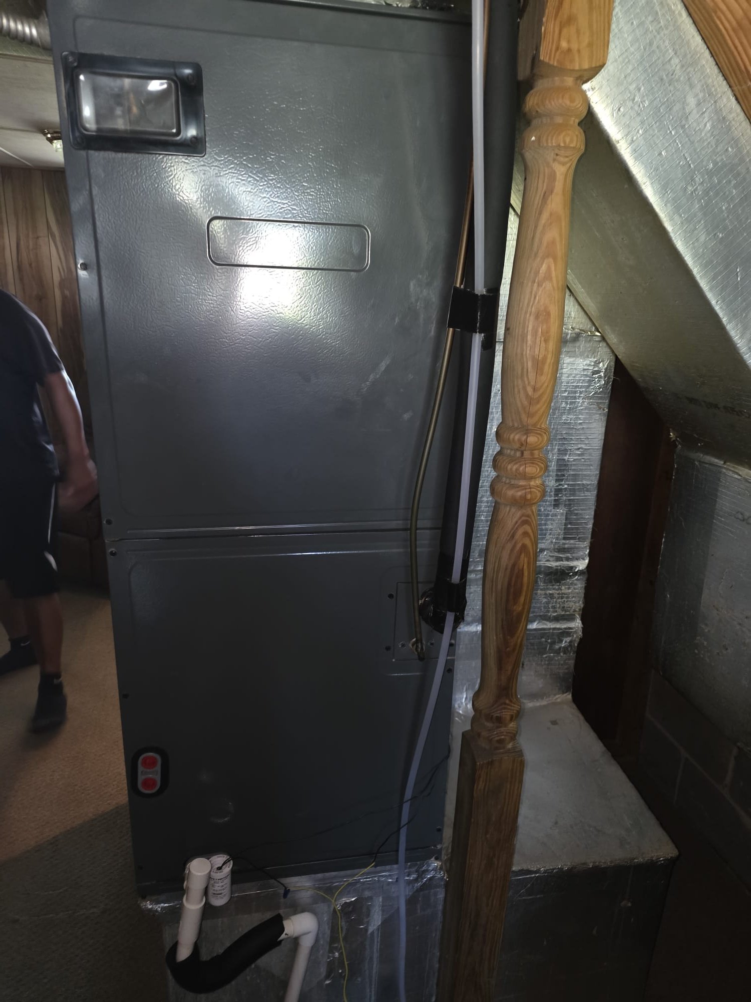 Indoor air handler area with recent service work completed
