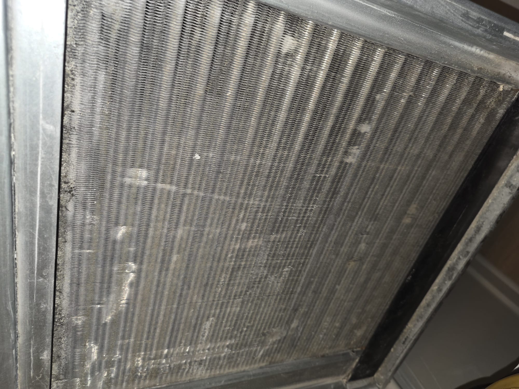 A dirty HVAC coil that needs cleaning