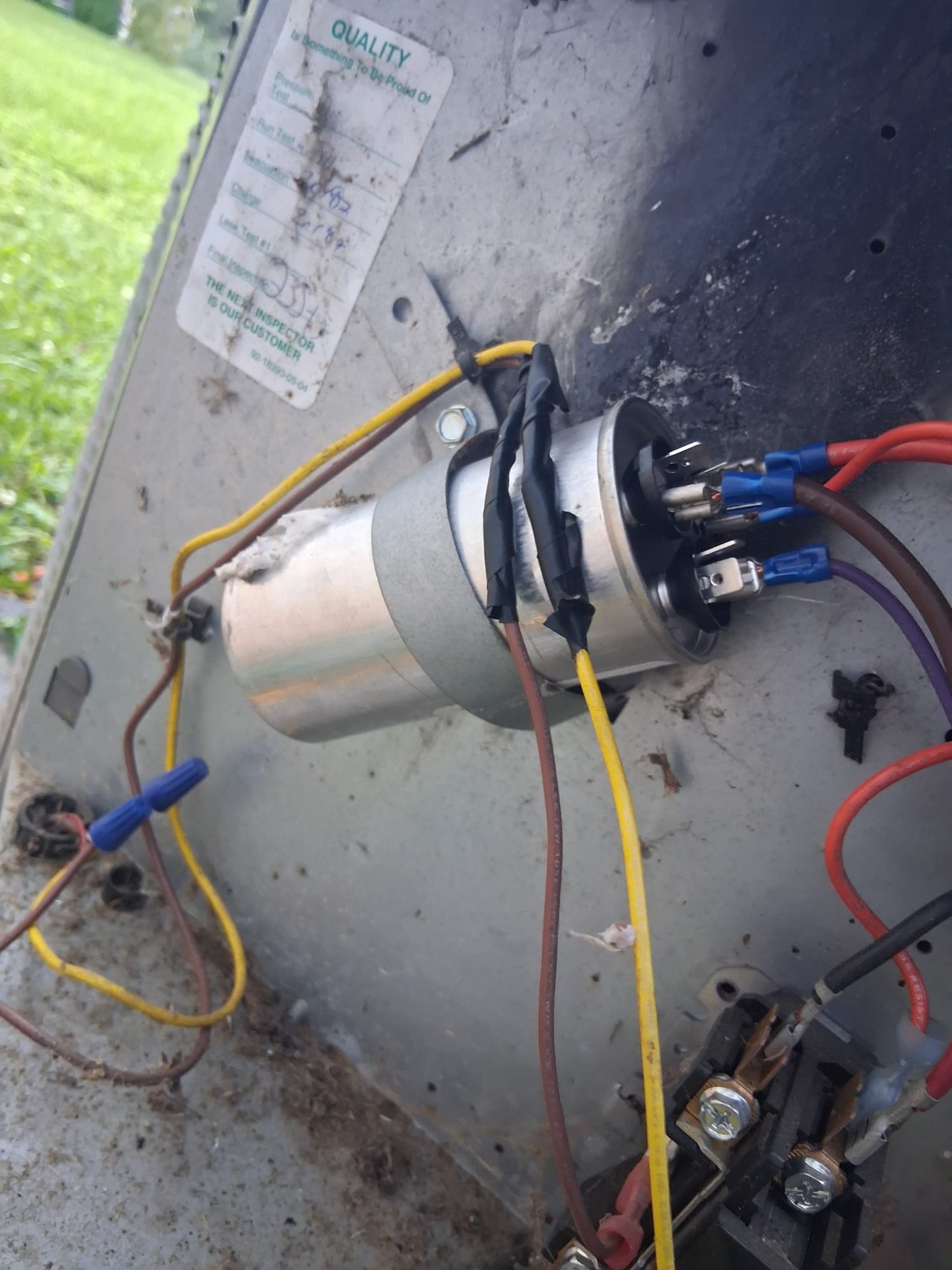 Replacement capacitor installed in the outdoor unit